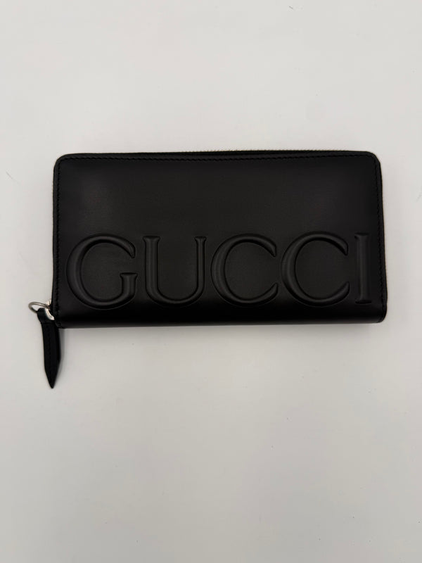 GUCCI - Portafoglio zip nero logo frontale Embossed