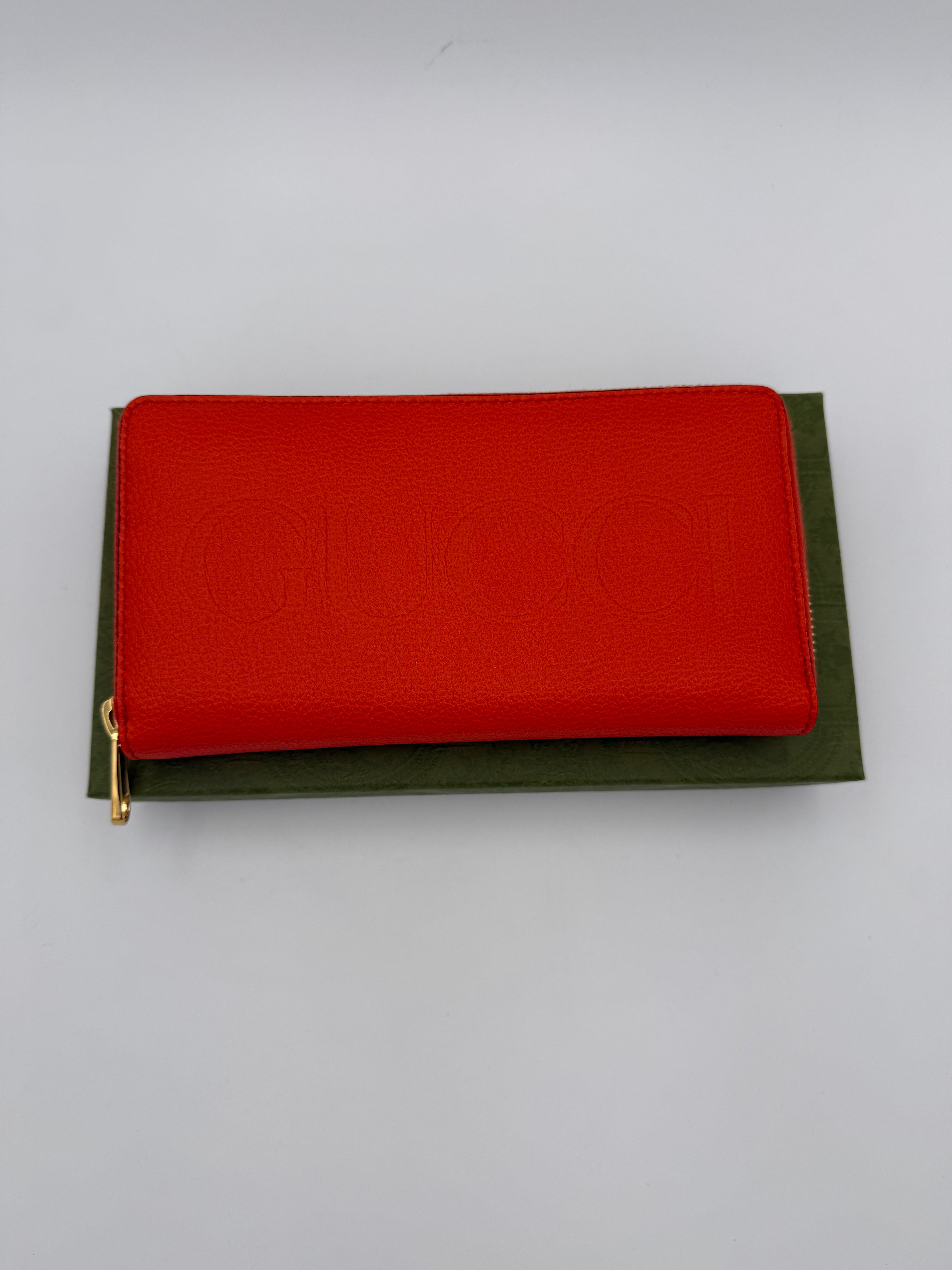 GUCCI - Portafoglio zip arancione logo frontale