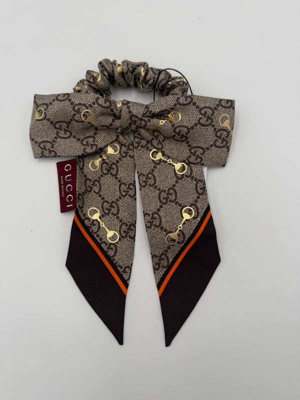 GUCCI - Elastico per capelli con fiocco GG