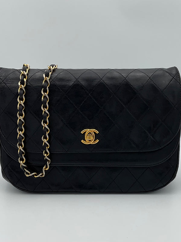 CHANEL - Timeless Classique Round Flap